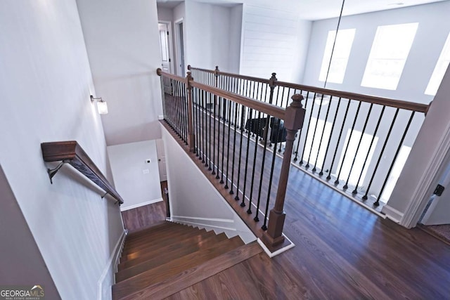 125 Leveret Rd, Locust Grove, GA 30248 - staircase with wood finished floors and baseboards