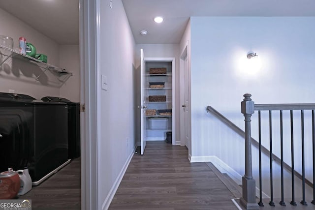 125 Leveret Rd, Locust Grove, GA 30248 - hall with an upstairs landing, dark wood-style flooring, and baseboards