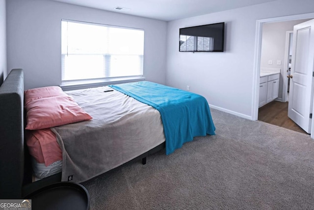 125 Leveret Rd, Locust Grove, GA 30248 - carpeted bedroom with baseboards