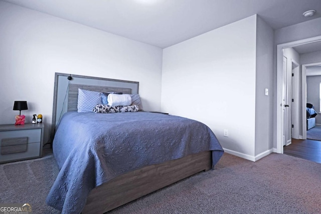 125 Leveret Rd, Locust Grove, GA 30248 - carpeted bedroom with baseboards