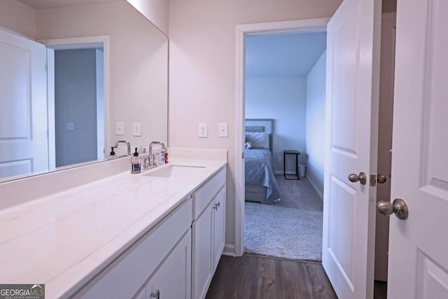 125 Leveret Rd, Locust Grove, GA 30248 - ensuite bathroom with wood finished floors and vanity
