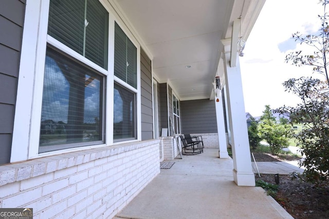 125 Leveret Rd, Locust Grove, GA 30248 - view of patio featuring covered porch