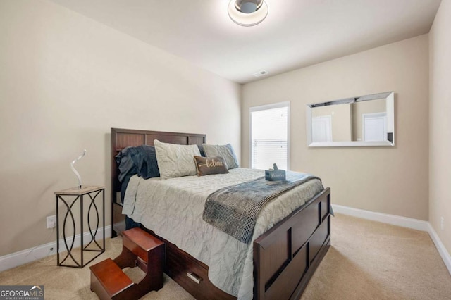 3755 Lake Haven Way, Atlanta, GA 30349 - bedroom with light colored carpet and baseboards