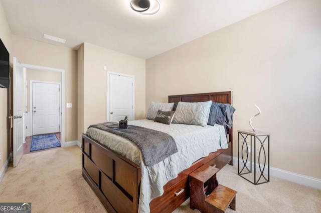 3755 Lake Haven Way, Atlanta, GA 30349 - bedroom featuring light carpet and baseboards