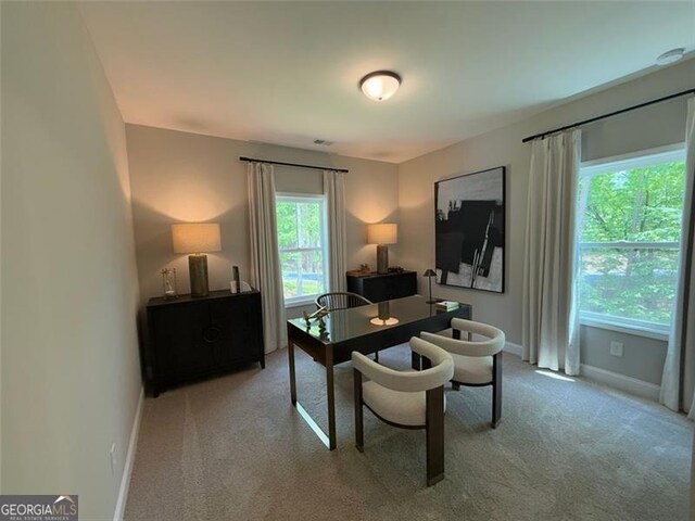 office area with baseboards and carpet