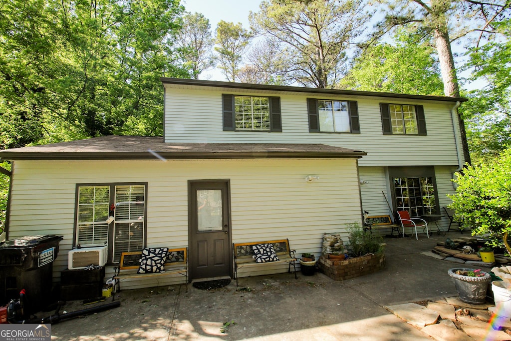 rear view of house with a patio area