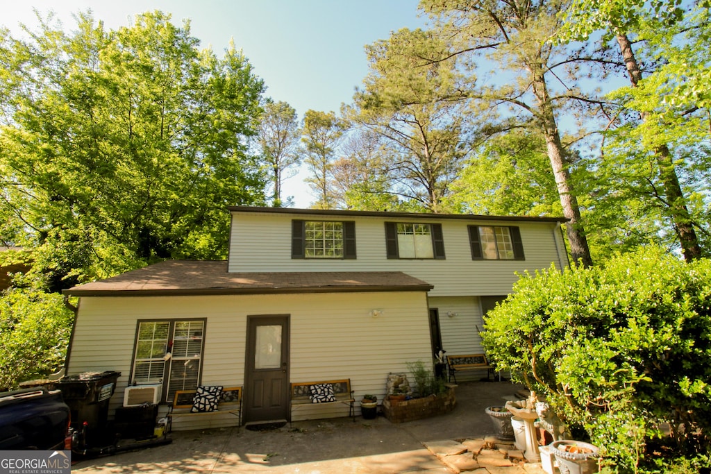 rear view of property with a patio
