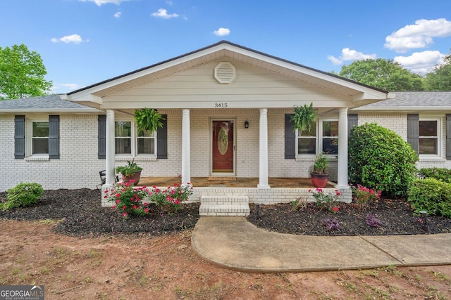 3415 Trickum Rd, Woodstock, GA 30188 - ranch-style home with a porch and brick siding