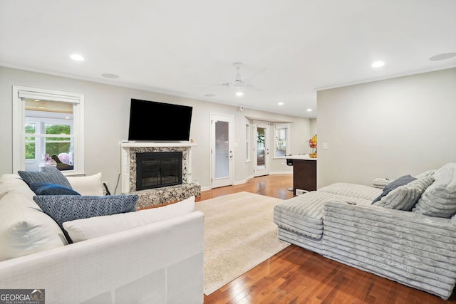3415 Trickum Rd, Woodstock, GA 30188 - living area with ceiling fan, recessed lighting, light wood-style floors, a fireplace, and baseboards