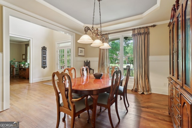 121 Ridge View Dr, Ball Ground, GA 30107 - dining room with ornamental molding, light wood-type flooring, and a raised ceiling