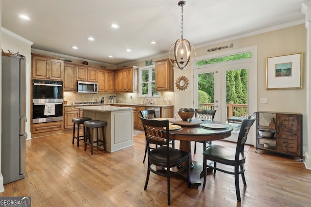 121 Ridge View Dr, Ball Ground, GA 30107 - dining area with ornamental molding, light wood-style flooring, a chandelier, recessed lighting, and french doors