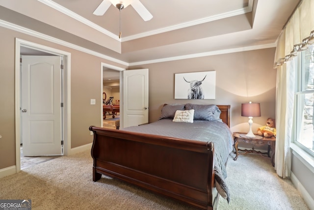 121 Ridge View Dr, Ball Ground, GA 30107 - bedroom with light colored carpet, a tray ceiling, ornamental molding, and ceiling fan