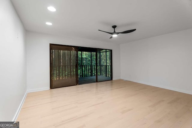 5020 Vallo Vista Ct, Atlanta, GA 30342 - spare room featuring light wood-type flooring, baseboards, ceiling fan, and recessed lighting