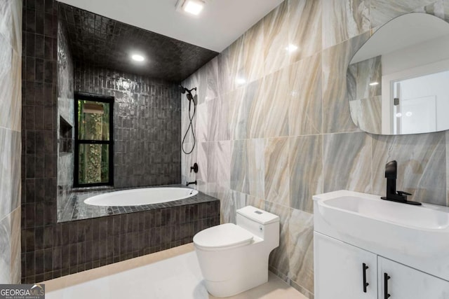 5020 Vallo Vista Ct, Atlanta, GA 30342 - full bath featuring vanity, tile walls, tiled shower / bath combo, and toilet