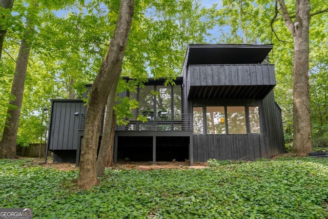 5020 Vallo Vista Ct, Atlanta, GA 30342 - view of outdoor structure with a sunroom