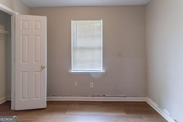 67 Jennifer Ln, Rydal, GA 30171 - unfurnished bedroom featuring wood finished floors and baseboards