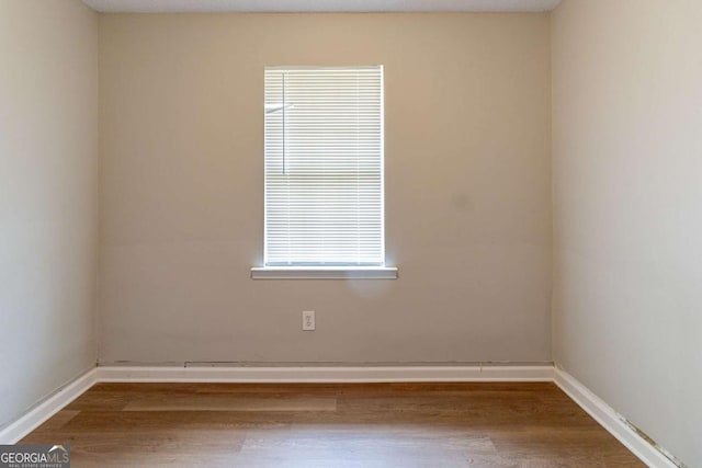 67 Jennifer Ln, Rydal, GA 30171 - empty room with wood finished floors and baseboards