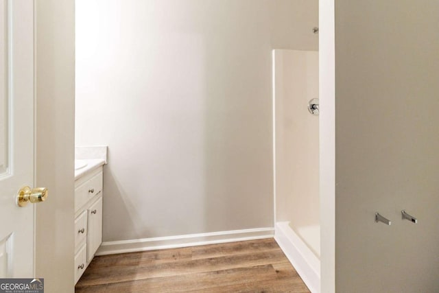 67 Jennifer Ln, Rydal, GA 30171 - full bath with vanity, a shower, and wood finished floors