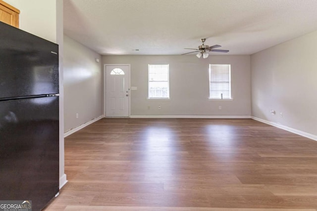 67 Jennifer Ln, Rydal, GA 30171 - foyer with baseboards, light wood-style flooring, and ceiling fan