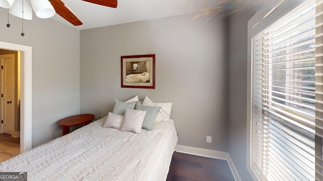 1202 Shiva Blvd, Winder, GA 30680 - bedroom with wood finished floors, baseboards, and ceiling fan
