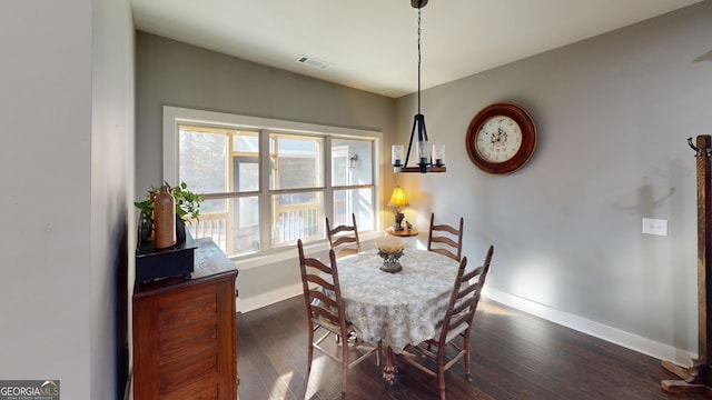 1202 Shiva Blvd, Winder, GA 30680 - dining room with baseboards and dark wood-type flooring
