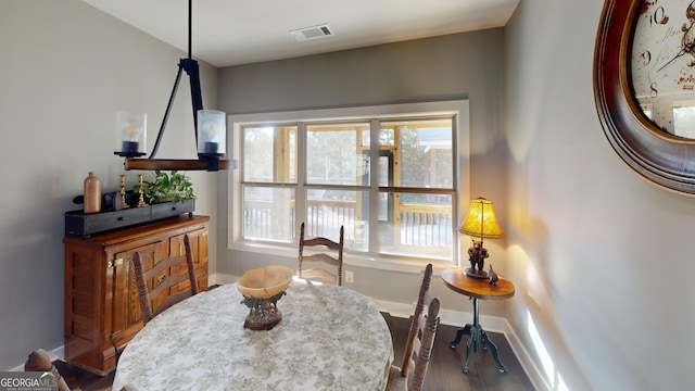 1202 Shiva Blvd, Winder, GA 30680 - dining space with wood finished floors and baseboards