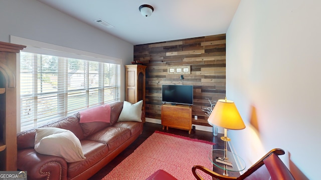 1202 Shiva Blvd, Winder, GA 30680 - living area with wood walls and wood finished floors