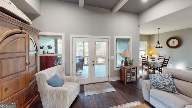 1202 Shiva Blvd, Winder, GA 30680 - living area featuring a high ceiling, french doors, dark wood-type flooring, beamed ceiling, and baseboards