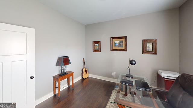 1202 Shiva Blvd, Winder, GA 30680 - living area with dark wood-style floors, baseboards, and an office area