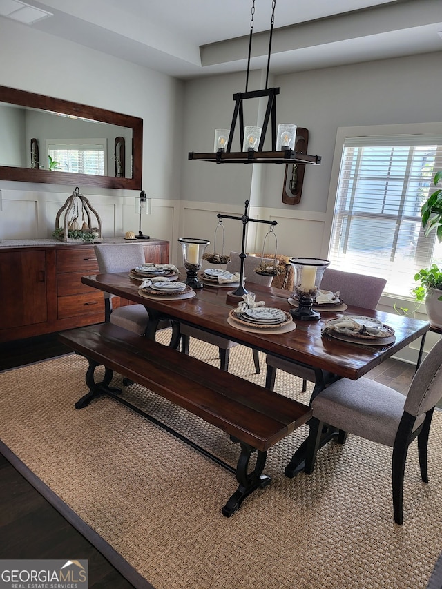1202 Shiva Blvd, Winder, GA 30680 - dining area with wainscoting, plenty of natural light, and wood finished floors