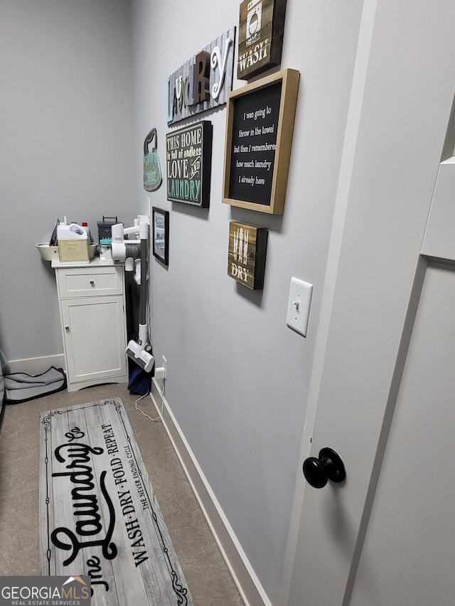 1202 Shiva Blvd, Winder, GA 30680 - bathroom with baseboards