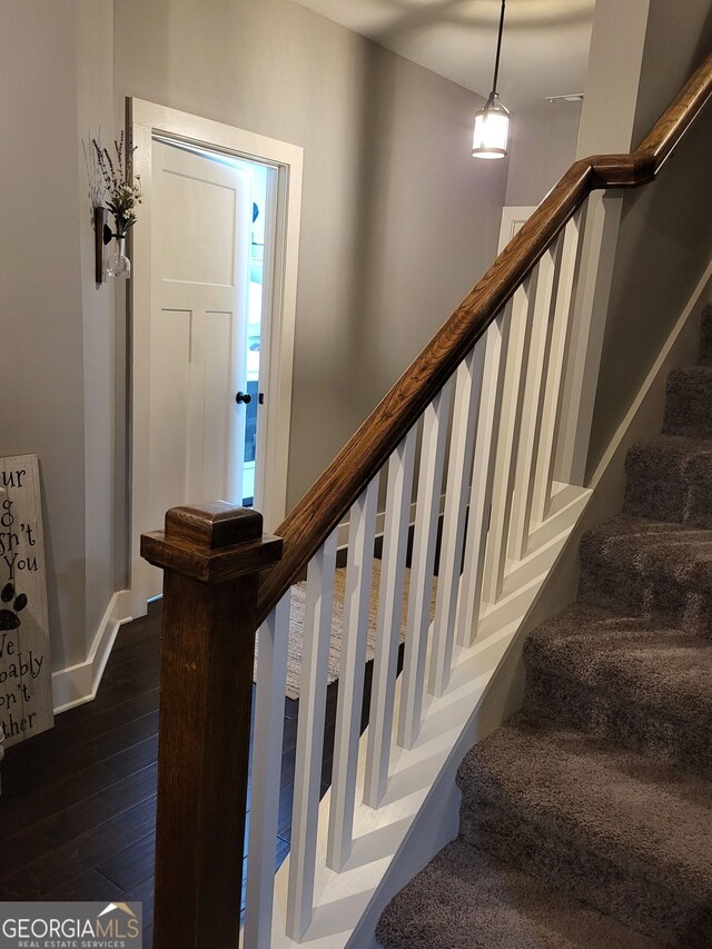 1202 Shiva Blvd, Winder, GA 30680 - staircase with wood-type flooring