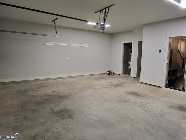 1202 Shiva Blvd, Winder, GA 30680 - garage with a garage door opener