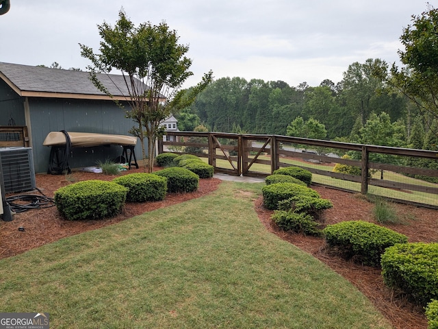 1202 Shiva Blvd, Winder, GA 30680 - view of yard featuring central AC