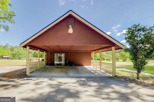 view of parking featuring driveway