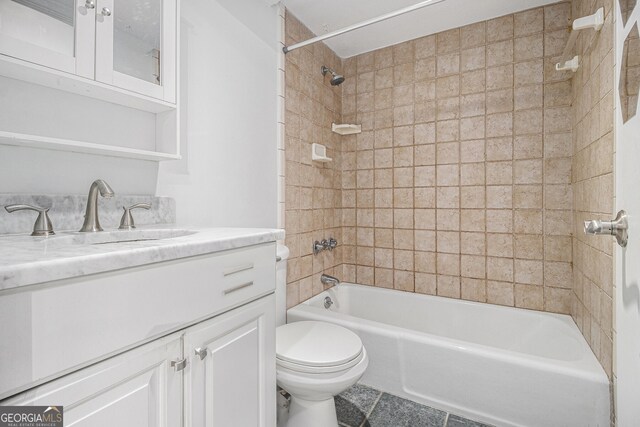 620 Peachtree St NE Unit 601, Atlanta, GA 30308 - bathroom featuring toilet, tile patterned floors, shower / bathing tub combination, and vanity