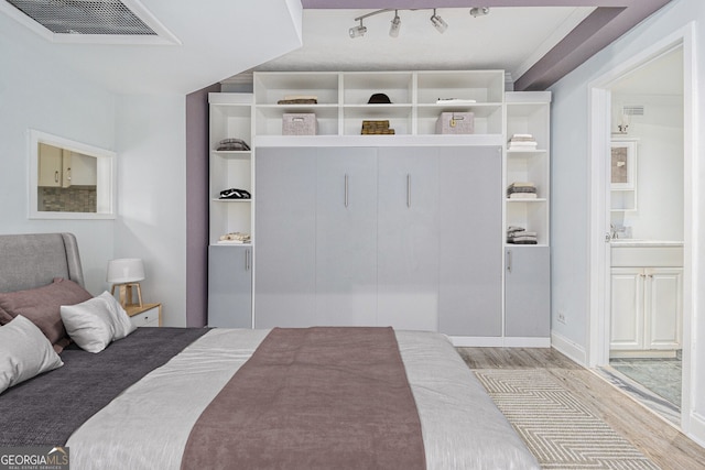 620 Peachtree St NE Unit 601, Atlanta, GA 30308 - bedroom featuring wood finished floors and visible vents