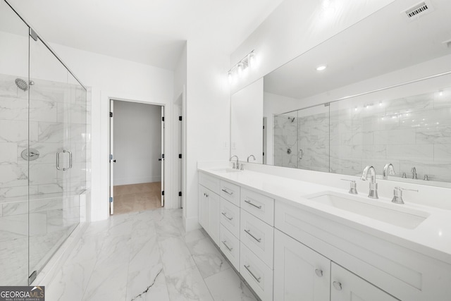 bathroom featuring visible vents, a marble finish shower, a sink, and marble finish floor