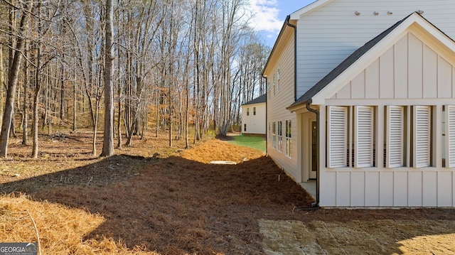 view of side of property with board and batten siding