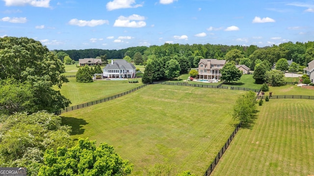 birds eye view of property featuring a rural view