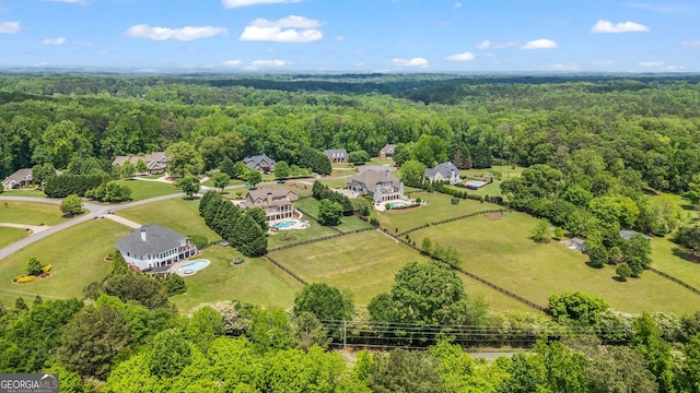 drone / aerial view with a forest view