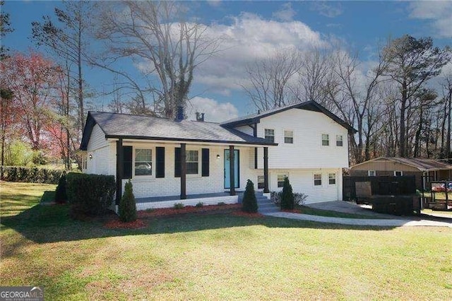 1616 W Kellogg Cir, Douglasville, GA 30134 - split level home with a porch and a front lawn