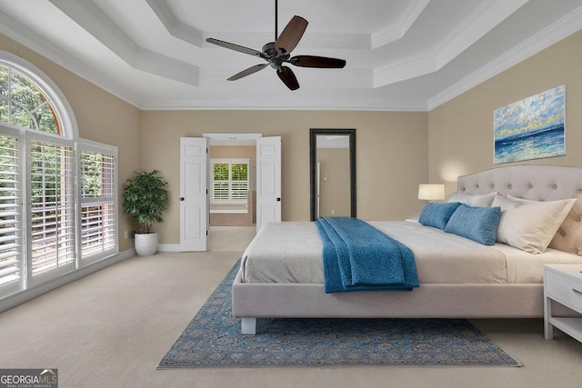 4810 Duncans Lake Dr, Buford, GA 30519 - bedroom with a tray ceiling, carpet, crown molding, a ceiling fan, and ensuite bath