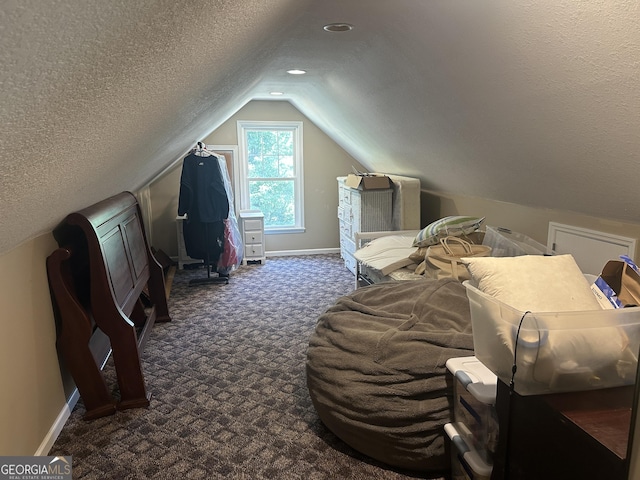 additional living space with dark colored carpet, a textured ceiling, baseboards, and vaulted ceiling