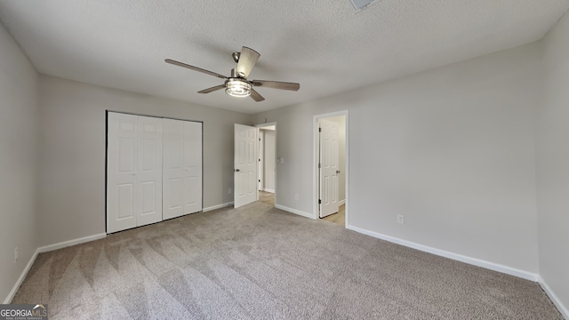 5326 Nader Pl, Stone Mountain, GA 30088 - unfurnished bedroom with carpet flooring, baseboards, and a closet