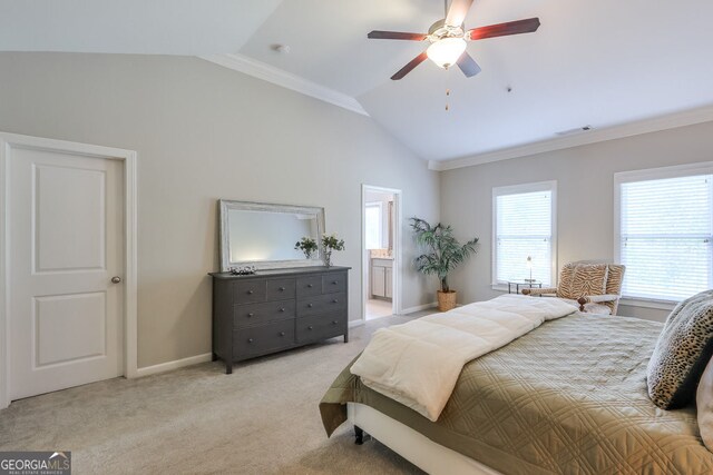 bedroom featuring light colored carpet, visible vents, baseboards, vaulted ceiling, and ornamental molding