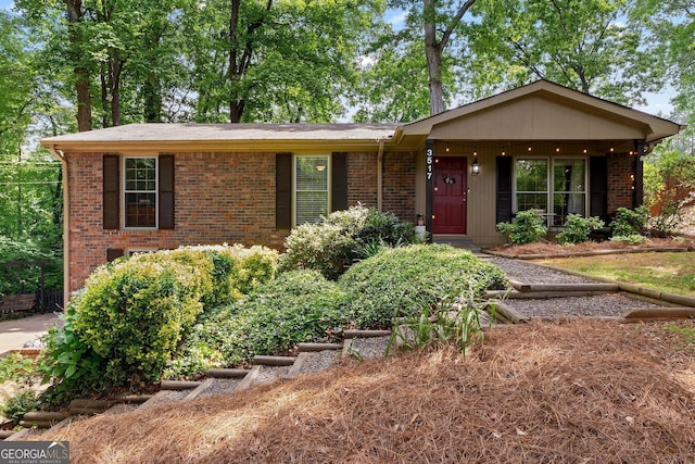 ranch-style house with brick siding