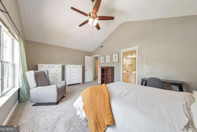 carpeted bedroom featuring connected bathroom, high vaulted ceiling, visible vents, and ceiling fan