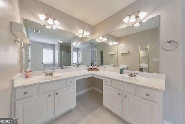 full bath featuring double vanity, visible vents, a shower stall, and a sink