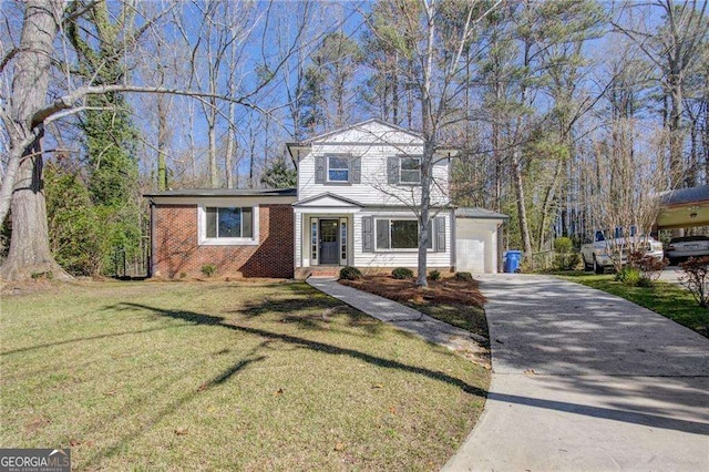 view of front of property with an attached garage, a front lawn, driveway, and brick siding